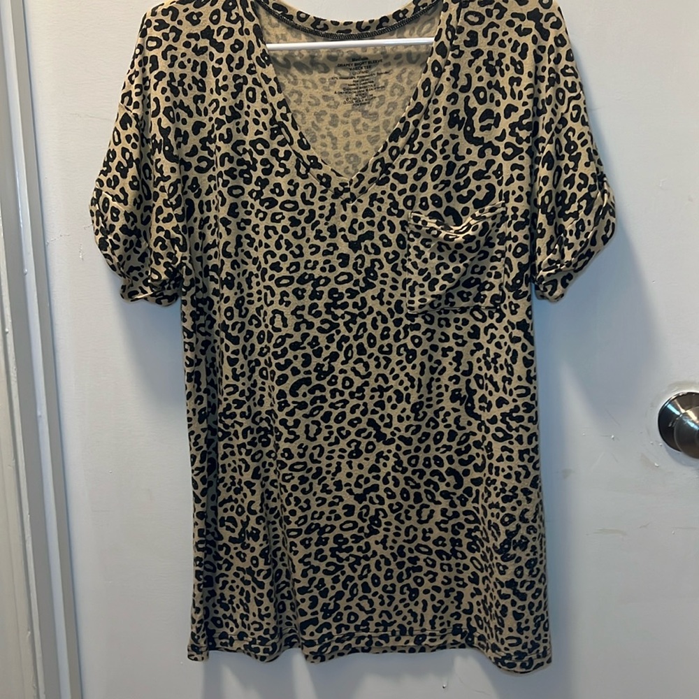 Woman’s short sleeve shirt.                  JT-C